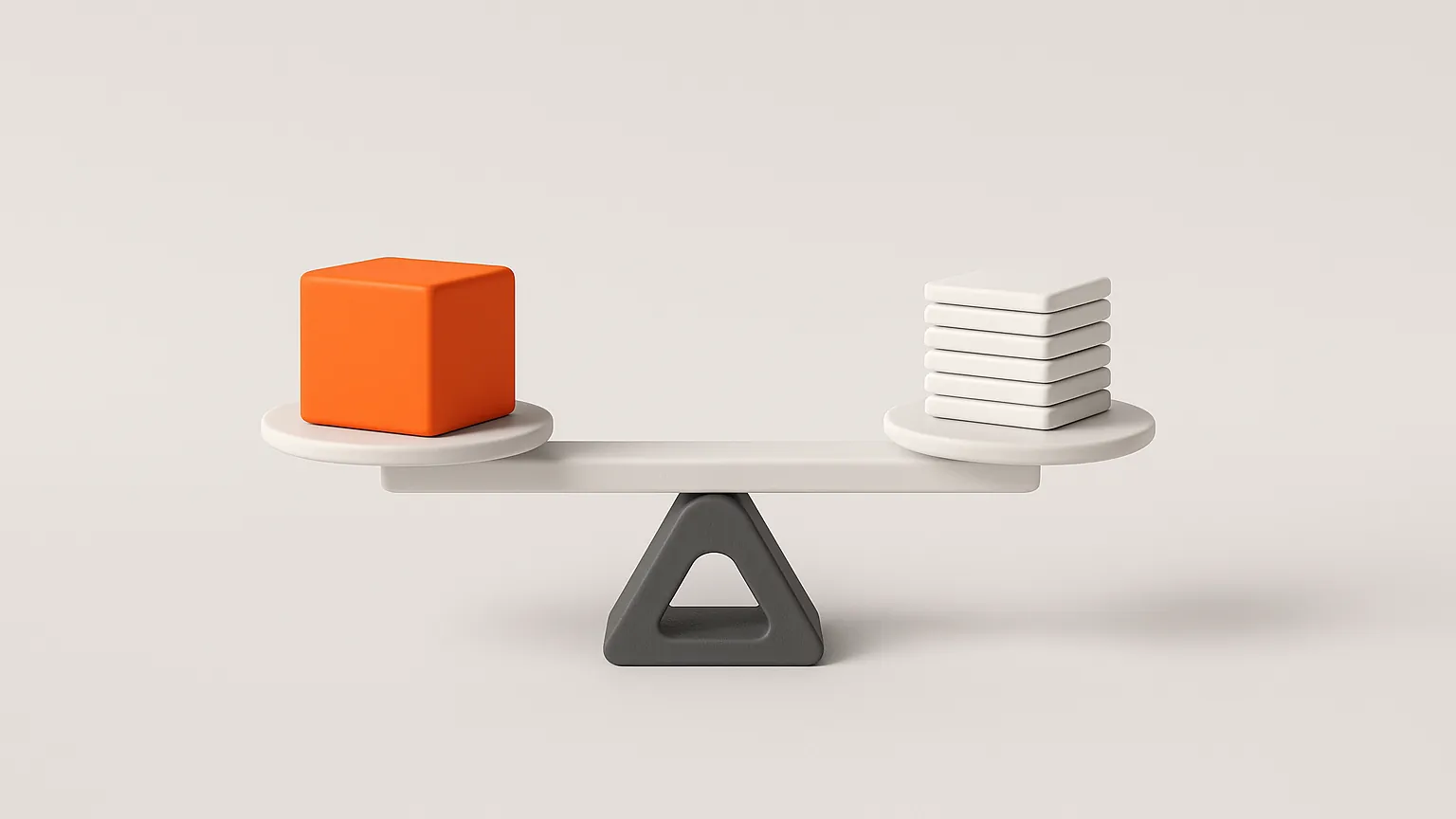 A white balance scale with an orange cube on one side and white tiles on the other